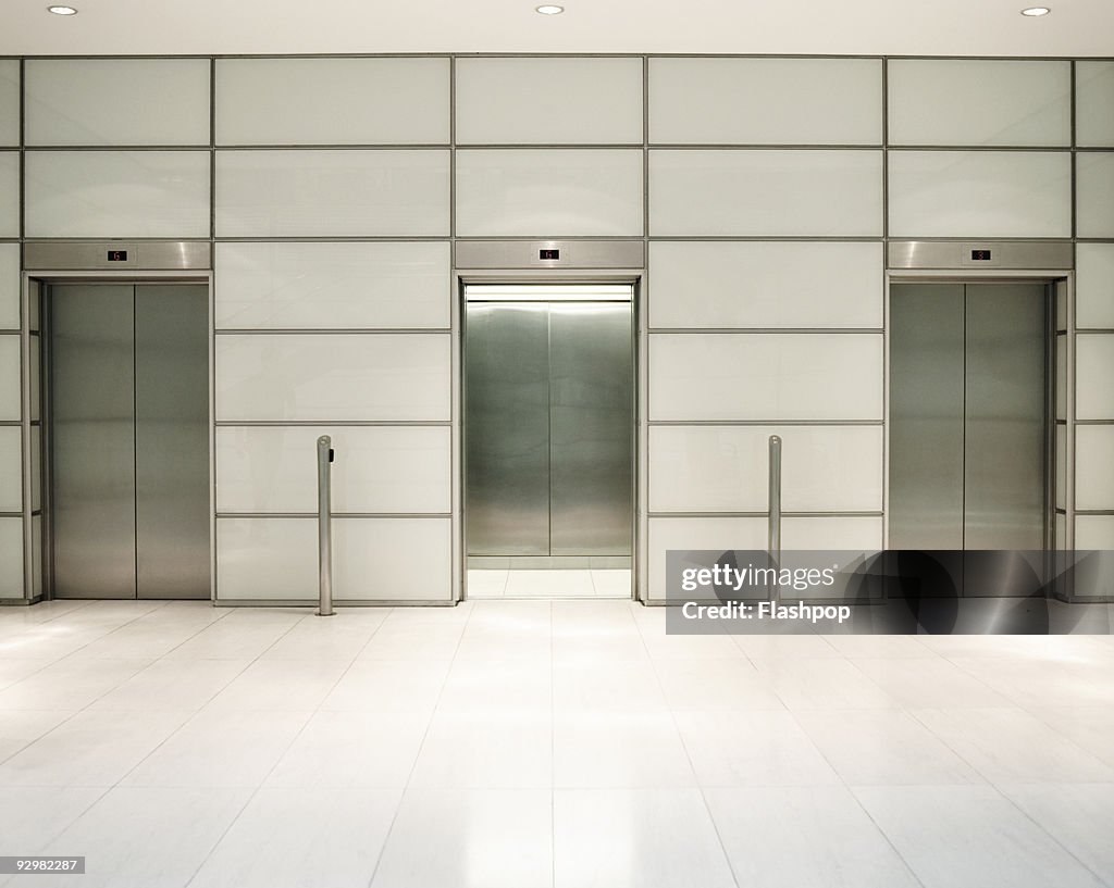 Three lifts in office building