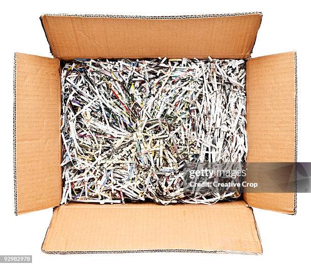 cardboard box filled with shredded paper - damaged parcel stock pictures, royalty-free photos & images