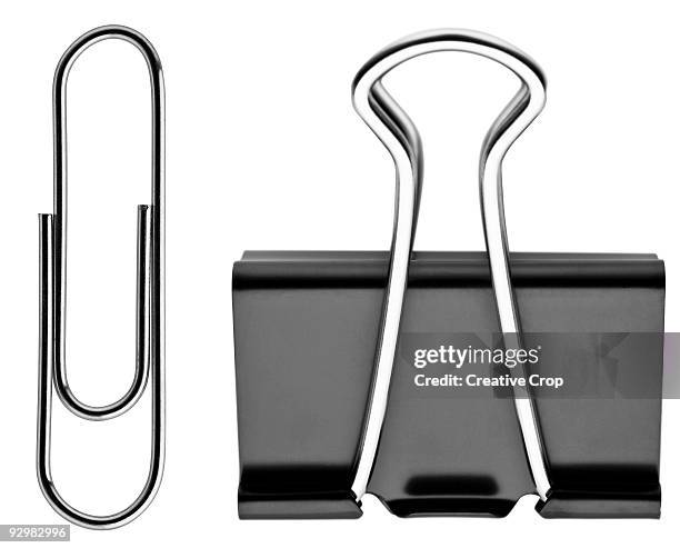 paper clip and binder clip - binder clip stock pictures, royalty-free photos & images