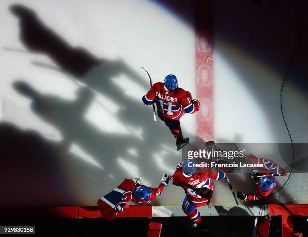 Brendan Gallagher and Andrew Shaw of the Montreal Canadiens take to the ice prior the NHL game against the New York Islanders at the Bell Centre on...