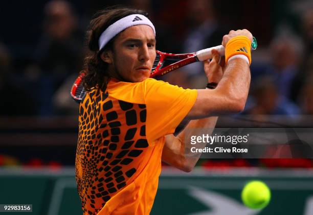 Juan Monaco of Spain in action during his match against Novak Djokovic of Serbia during the ATP Masters Series at the Palais Omnisports De...