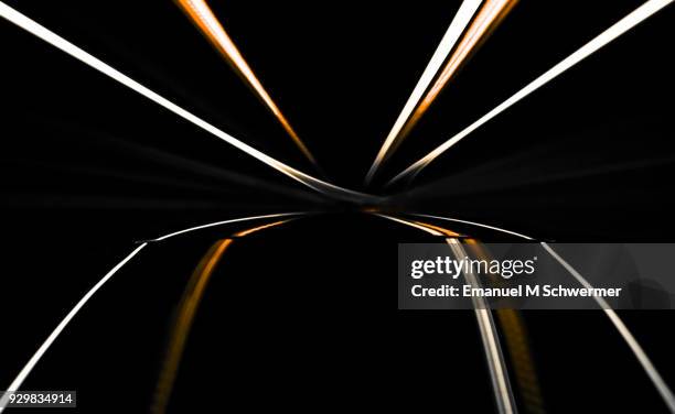 driving black german car with reflections and the rear window in foreground - munich night stock pictures, royalty-free photos & images