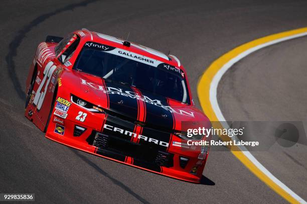 Spencer Gallagher, driver of the Kingman Chevrolet Chevrolet, practices for the NASCAR Xfinity Series DC Solar 200 at ISM Raceway on March 9, 2018 in...