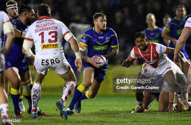 Daryl Clark of Warrington looks for a gap during the Betfred Super League between Warrington Wolves and St Helens on March 9, 2018 in Warrington,...