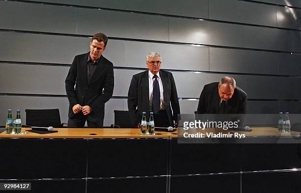 Manager Oliver Bierhoff, German Football Association president Theo Zwanziger and press officer Harald Stenger attend the press conference of the...