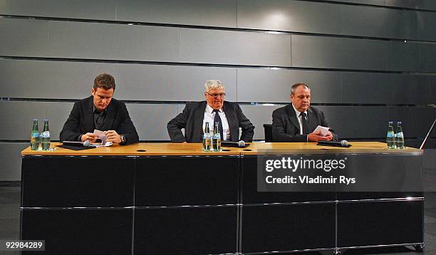 Manager Oliver Bierhoff, German Football Association president Theo Zwanziger and press officer Harald Stenger attend the press conference of the...