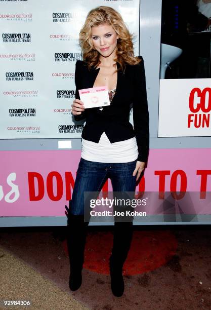 Actress AnnaLynne McCord collects kisses for the Troops at Military Island, Times Square on November 11, 2009 in New York City.