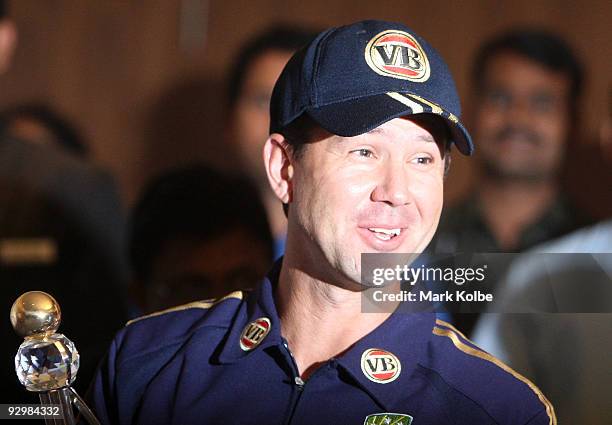 Ricky Ponting of Australia shares a laugh with MS Dhoni during the trophy presentation at the Four Points hotel after the abandoned seventh one day...