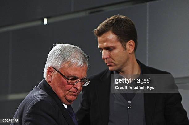 Manager Oliver Bierhoff and president Theo Zwanziger leave the press conference of the German national football team due to the death of Robert Enke...