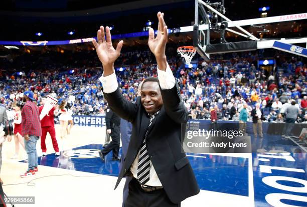 Head coach Avery Johnson of the Alabama Crimson Tide celebrates following the 81-63 win over the Auburn Tigers during the quarterfinals round of the...