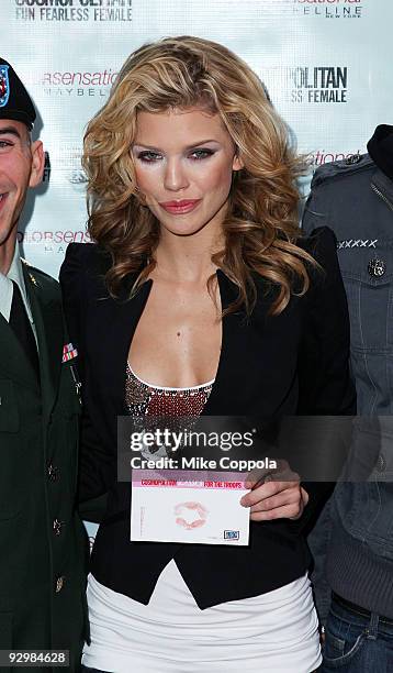 Actress AnnaLynne McCord collects Kisses for the Troops at Military Island, Times Square on November 11, 2009 in New York City.