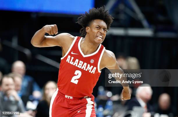 Collin Sexton of the Alabama Crimson Tide celebrates in the 81-63 win over the Auburn Tigers during the quarterfinals round of the 2018 SEC...