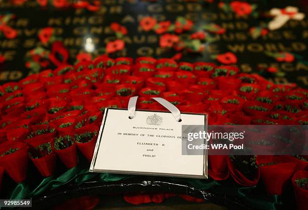 Wreath with a note reading 'In Memory Of The Glorious Dead - Elizabeth R and Philip', lies on the Tomb of the Unknown Soldier following a memorial...