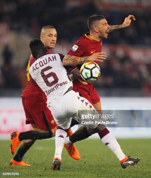 Aleksandar Kolarov of AS Roma competes for the ball with Afryie Acquah of Torino FC during the Serie A match between AS Roma and Torino FC at Stadio...