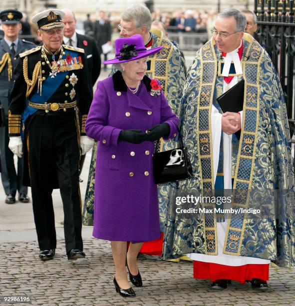 Prince Philip, The Duke of Edinburgh, Queen Elizabeth II and The Very Reverend Dr John Hall, Dean of Westminster Abbey attend the Armistice Day...