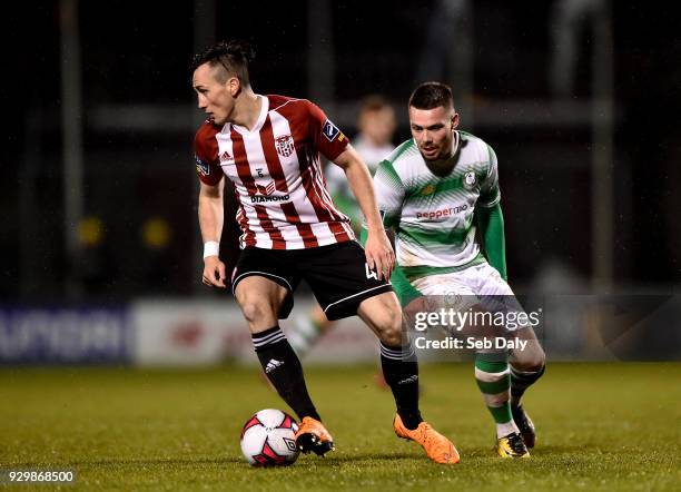 Dublin , Ireland - 9 March 2018; Aaron McEneff of Derry City in action against Brandon Miele of Shamrock Rovers during the SSE Airtricity League...