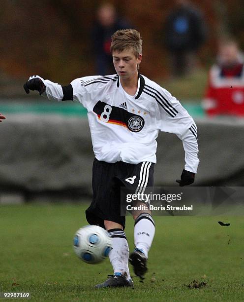 Philipp Mueller of Germany runs with the ball during the U15 International Friendly Match between Germany and Estland at the 'Mueritz Stadion' on...