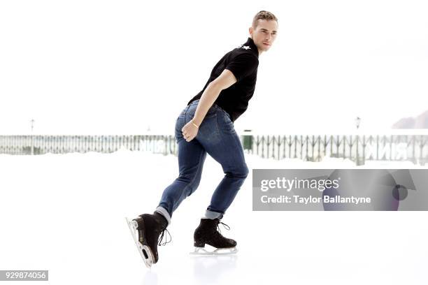 Portrait of Team USA Adam Rippon posing on the ice during photo shoot at The Rink at Brookfield Place. Rippon won a bronze medal in the Team event at...