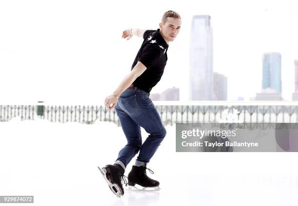 Portrait of Team USA Adam Rippon posing on the ice during photo shoot at The Rink at Brookfield Place. Rippon won a bronze medal in the Team event at...