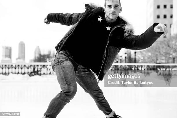 Portrait of Team USA Adam Rippon posing on the ice during photo shoot at The Rink at Brookfield Place. Rippon won a bronze medal in the Team event at...