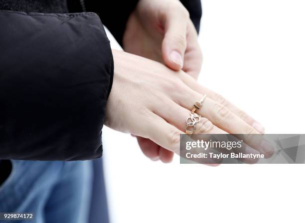 Closeup portrait of Olympic chain ring on hand of Team USA Adam Rippon posing during photo shoot at The Rink at Brookfield Place. Rippon won a bronze...