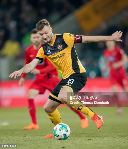 Florian Ballas of Dresden plays the ball during the Second Bundesliga match between SG Dynamo Dresden and 1. FC Heidenheim 1846 at DDV-Stadion on...