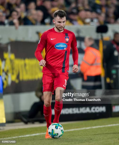 Denis Thomalla of Heidenheim plays the ball during the Second Bundesliga match between SG Dynamo Dresden and 1. FC Heidenheim 1846 at DDV-Stadion on...