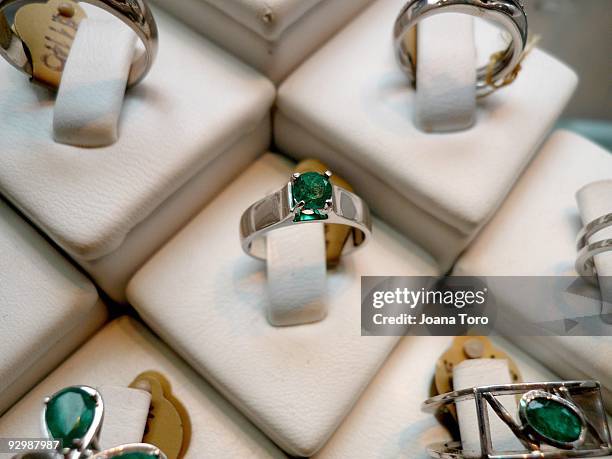 Emerald rings on sale in a display case on March 25, 2009 in Bogota, Cundinamarca, Colombia.Colombia produces 55% of the world's emerald market....
