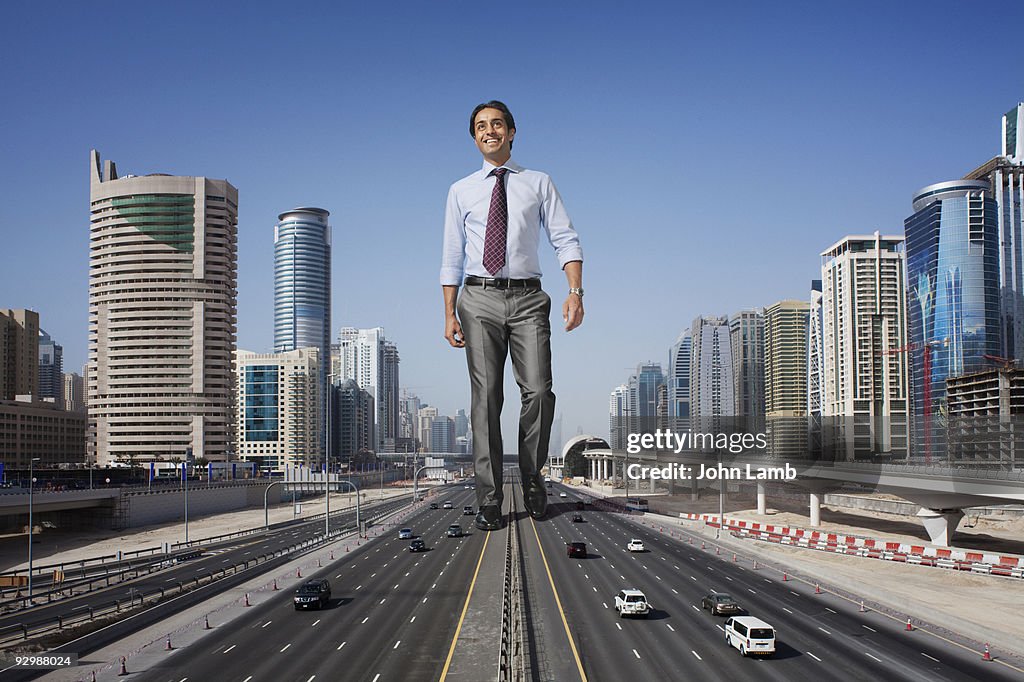 Big giant businessman walking in Dubai