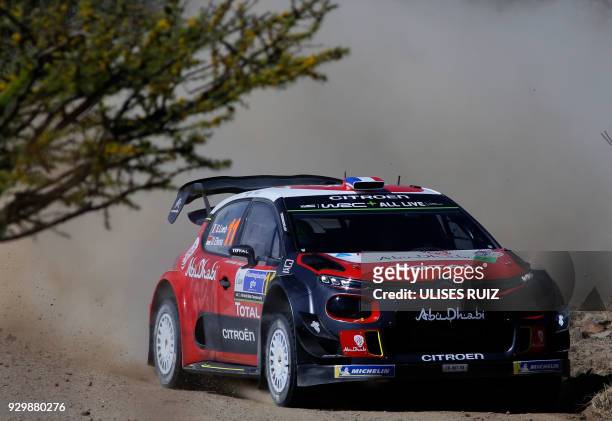 French driver Sebastien Loeb steers his Citroen C3 with co-driver Daniel Elena of Monaco, during the first day of the 2018 FIA World Rally...