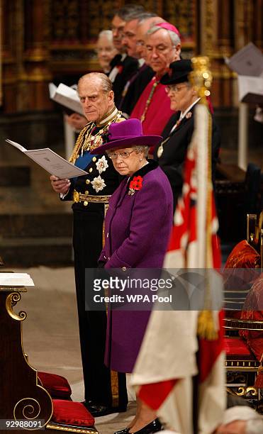 Queen Elizabeth II and Prince Philip, Duke of Edinburgh during a memorial service to mark the passing of the World War I generation at Westminster...