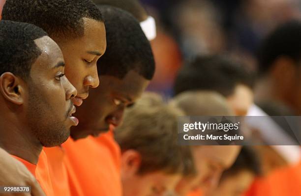 Scoop Jardine and Wes Johnson of the Syracuse Orange look on during the National Anthem before the game against the Albany Great Danes on November 9,...