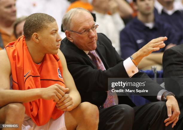 Coach Jim Boeheim and Brandon Triche of the Syracuse Orange talk during a timeout during the game against the Albany Great Danes on November 9, 2009...