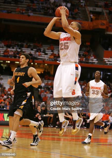 Brandon Triche of the Syracuse Orange shoots the ball during the game against the Albany Great Danes on November 9, 2009 at the Carrier Dome in...