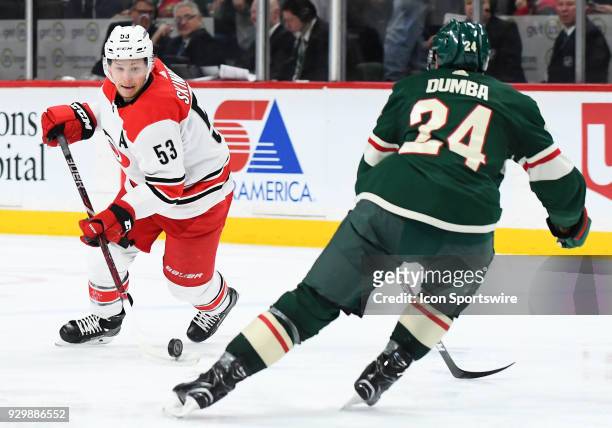Carolina Hurricanes Left Wing Jeff Skinner flips the puck into the zone during a NHL game between the Minnesota Wild and Carolina Hurricanes on March...