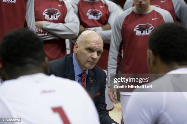 Head coach Phil Martelli of the Saint Joseph's Hawks talks to his team during a timeout against the George Mason Patriots in the Quarterfinals of the...