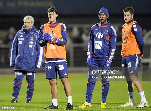 French national football team's coach Raymond Domenech, midfielder Yoann Gourcuff, forwards Nicolas Anelka and Andre-Pierre Gignac attend a training...