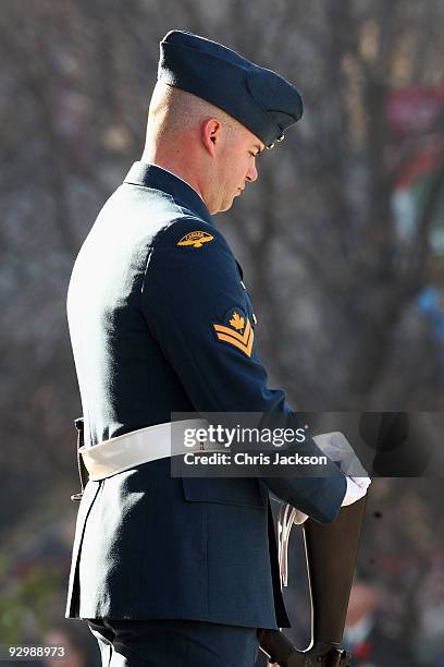 Soldier stands on the National War Memorial during a Remembrance Day Service on November 11, 2009 in Ottawa, Canada. The Royal couple are visiting...