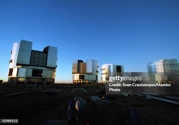 The four telescopes of the Very Large Telescope as the sun rises over the Atacama desert on October 27 in Paranal, Chile. The VLT Observatory...