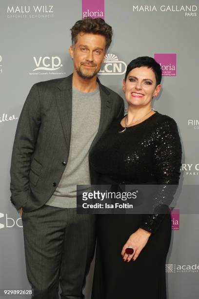 Wayne Carpendale and Melanie Meiritz attend the Gloria - Deutscher Kosmetikpreis at Hilton Hotel on March 9, 2018 in Duesseldorf, Germany.