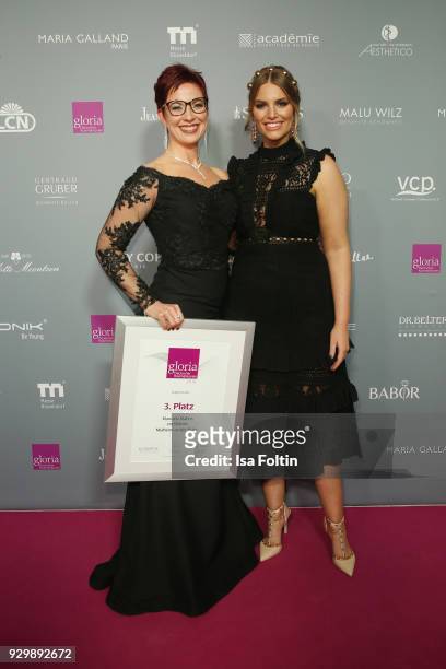 Manuela Mahns and Angelina Kirsch attend the Gloria - Deutscher Kosmetikpreis at Hilton Hotel on March 9, 2018 in Duesseldorf, Germany.