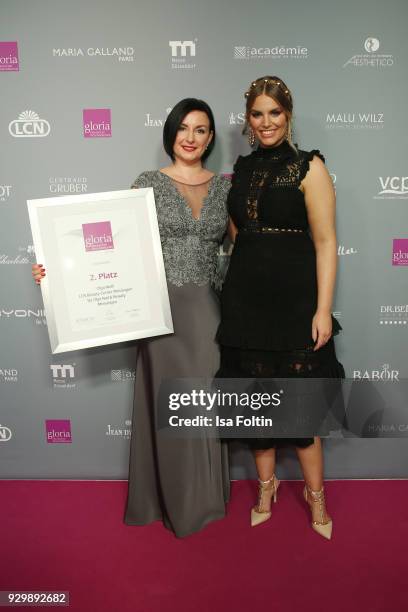 Olga Wolf and Angelina Kirsch attend the Gloria - Deutscher Kosmetikpreis at Hilton Hotel on March 9, 2018 in Duesseldorf, Germany.