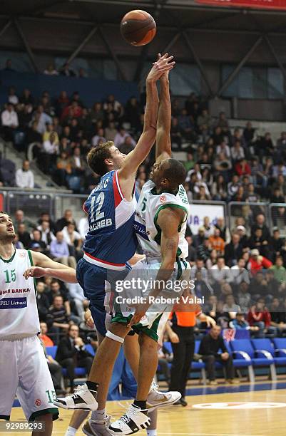 Luksa Andric, #12 of Cibona competes with Jamont Gordon, #5 of Cibona in action during the Euroleague Basketball Regular Season 2009-2010 Game Day 4...