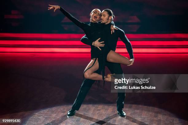 Gil Ofarim and Ekaterina Leonova perform on stage during the pre-show 'Wer tanzt mit wem? Die grosse Kennenlernshow' of the television competition...