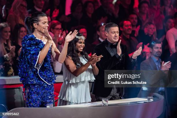 Jury members Jorge Gonzalez , Motsi Mabuse and Joachim Llambi perform on stage during the pre-show 'Wer tanzt mit wem? Die grosse Kennenlernshow' of...