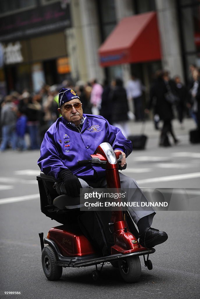 Orator rolle petroleum A US military veteran rides his scooter in the Veterans Day parade in...  News Photo - Getty Images