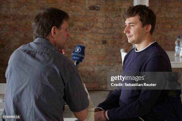 Sergei Karjakin is seen in an interview at the opening press conference during the World Chess Tournament on March 9, 2018 in Berlin, Germany.