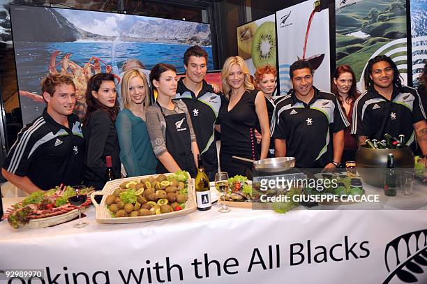 New Zealands All Black rugby players Ma'a Nonu , Mils Muliaina , Russian model and TV presenter Natasha Stefanenko All Blacks Anthony Boric and...