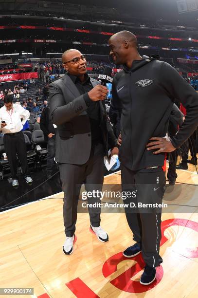 Caron Butler talks with Emeka Okafor of the New Orleans Pelicans before the game against the LA Clippers on March 6, 2018 at STAPLES Center in Los...