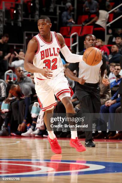 Kris Dunn of the Chicago Bulls handles the ball during the game against the Detroit Pistons on MARCH 9, 2018 at Little Caesars Arena in Detroit,...